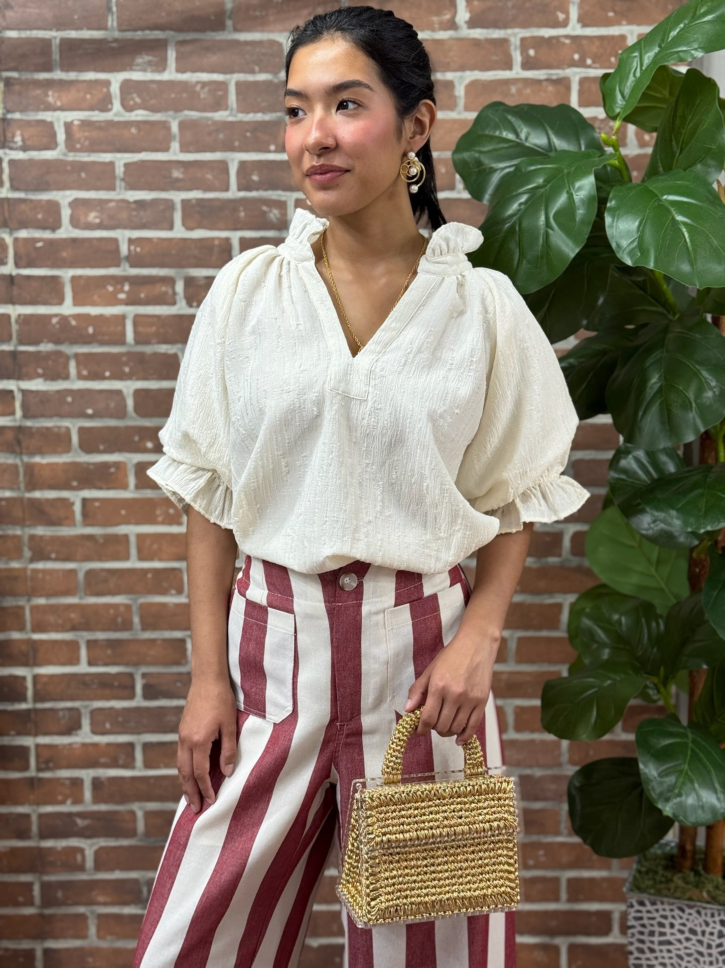 Pantalon rayas vino