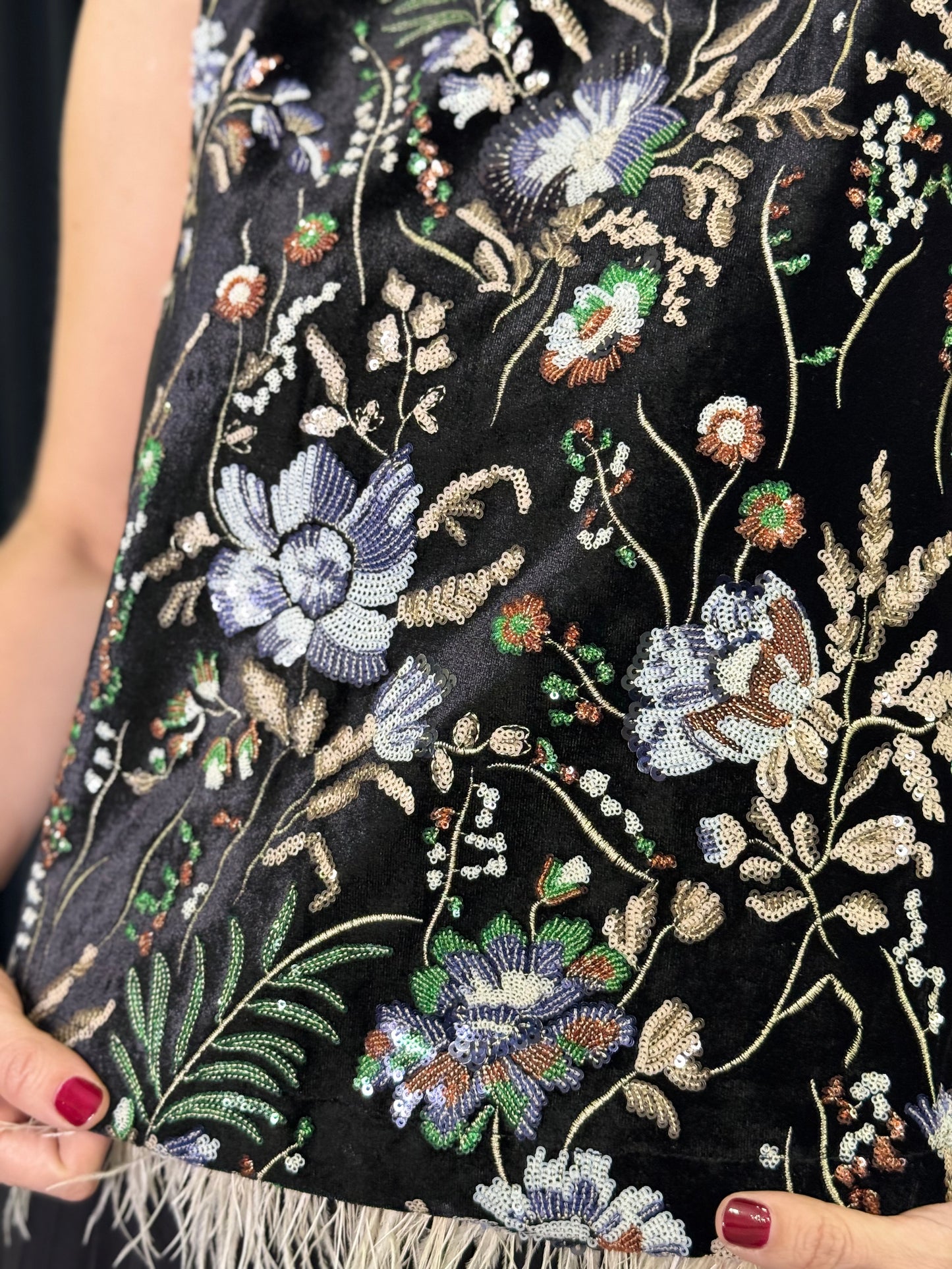 Blusa sin mangas plumas