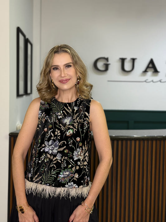 Blusa sin mangas plumas