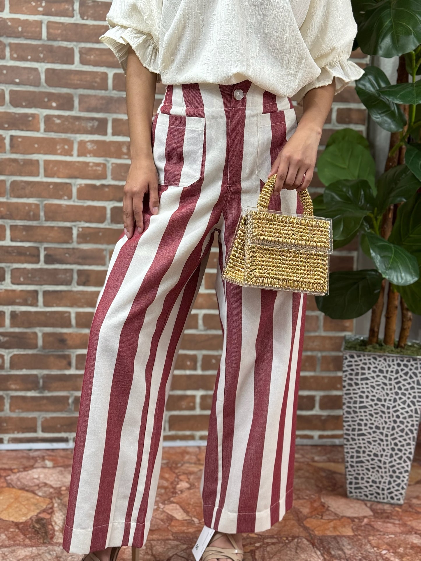Pantalon rayas vino