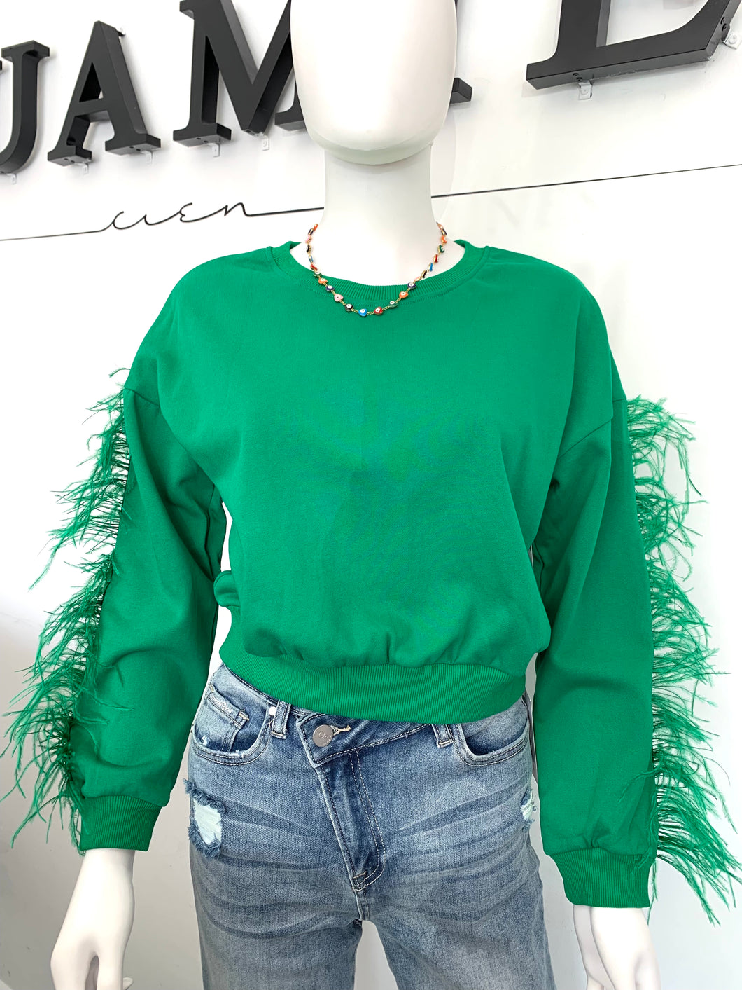 Suéter plumas verde